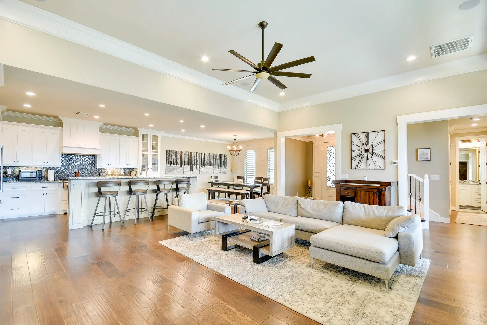 Spacious open-plan living area with kitchen, dining, and living room.