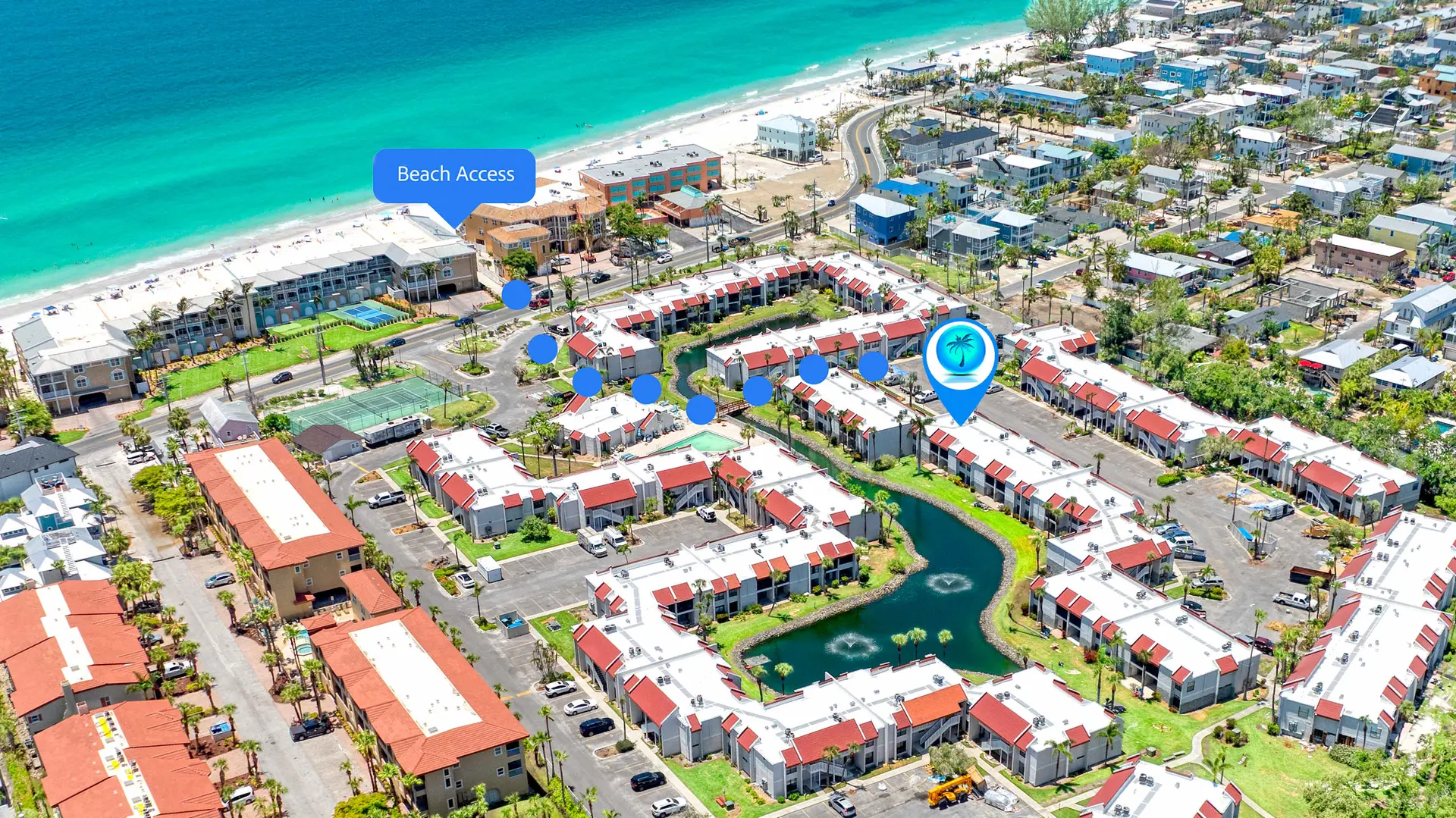 Aerial view of condos and beach access.