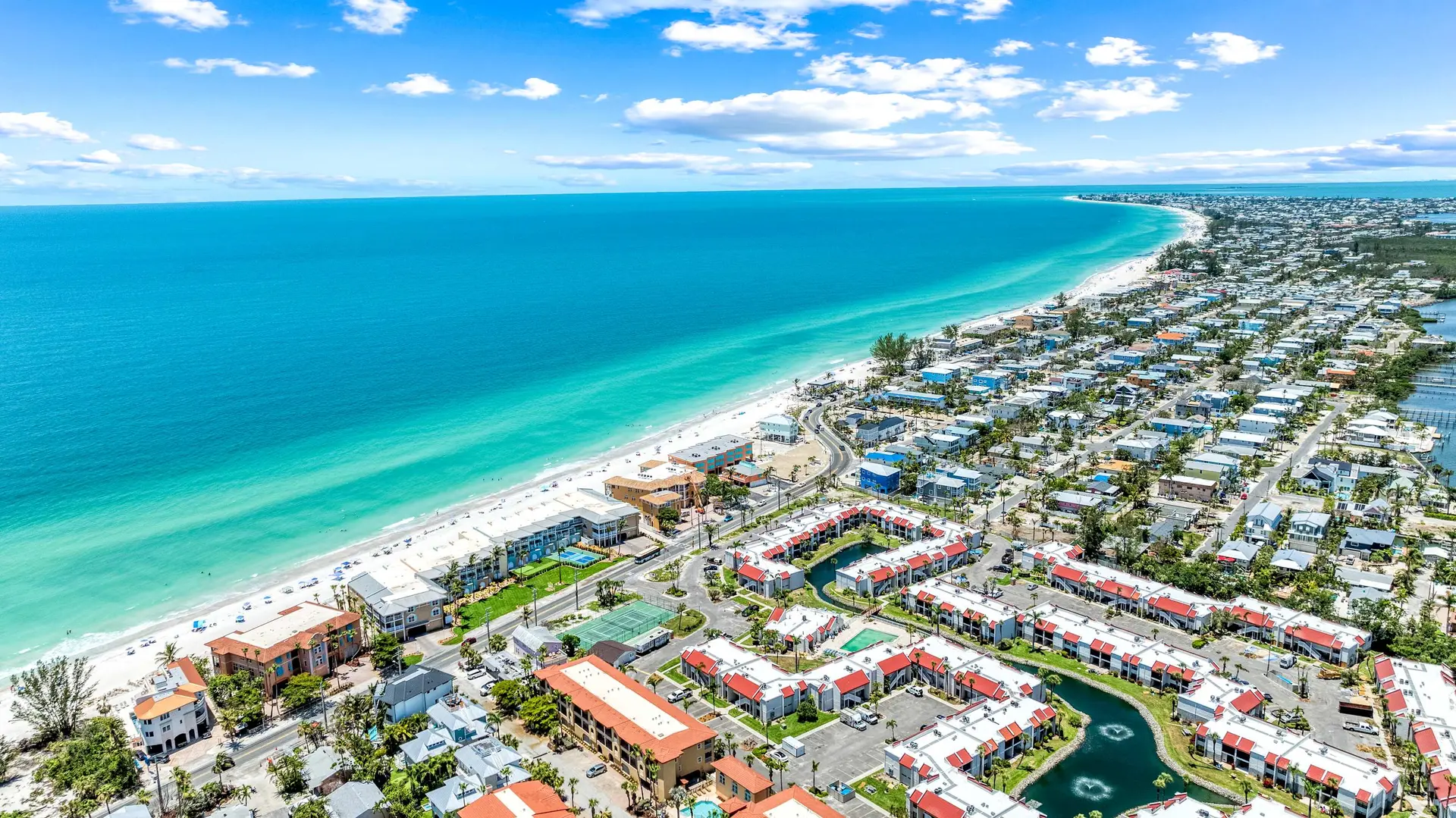 Largest Pool • Private Beach Access • Pickleball