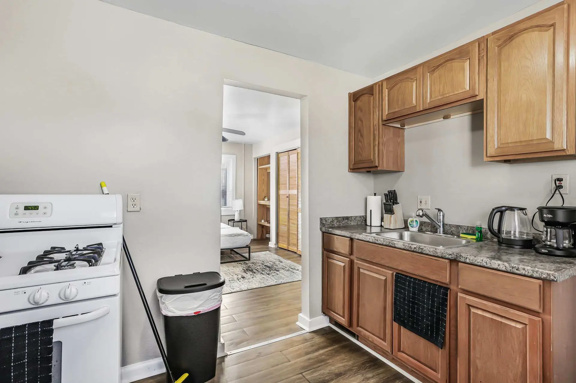 Kitchen and bedroom in a small apartment.