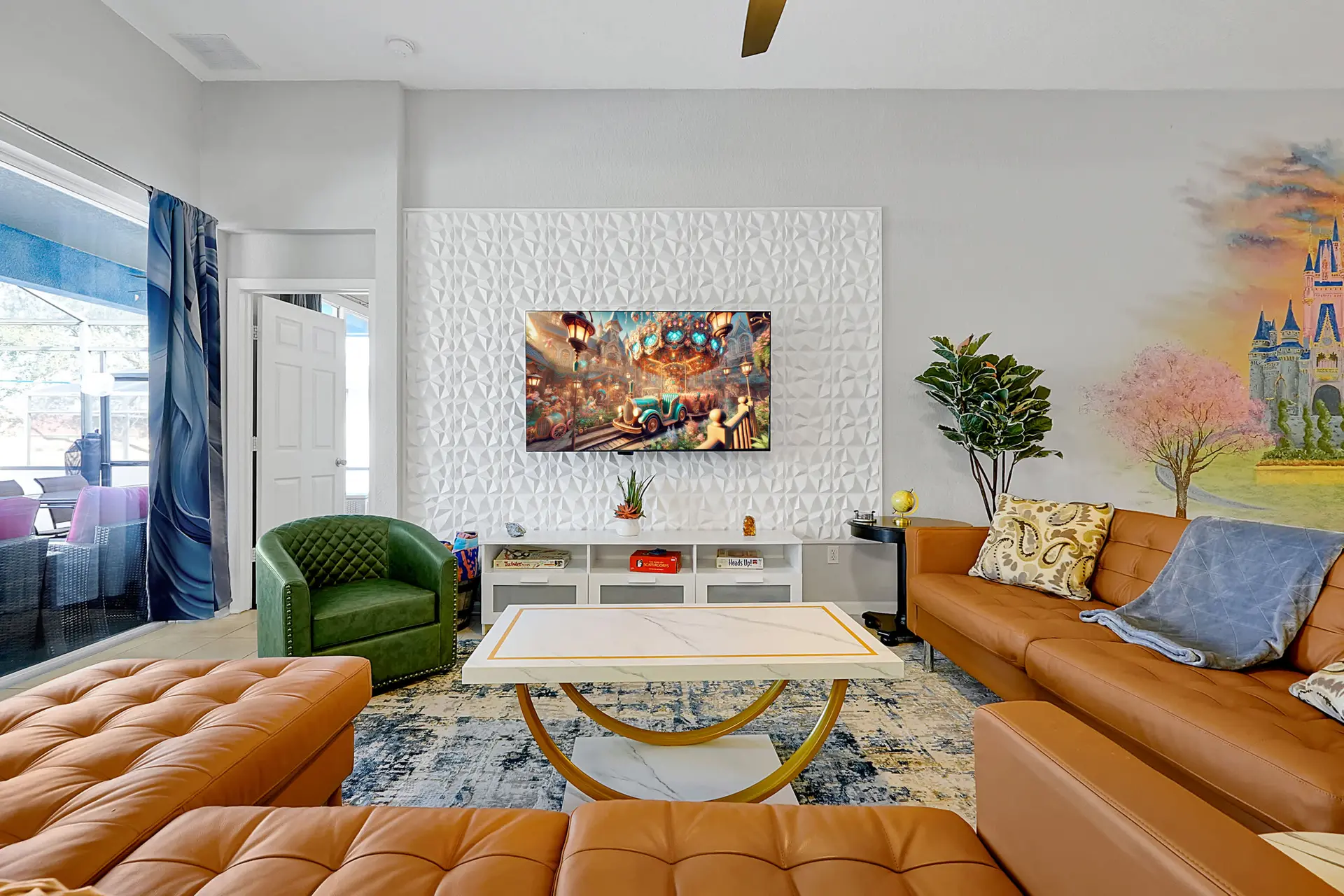 Living room with brown leather furniture and a colorful Disney castle mural.