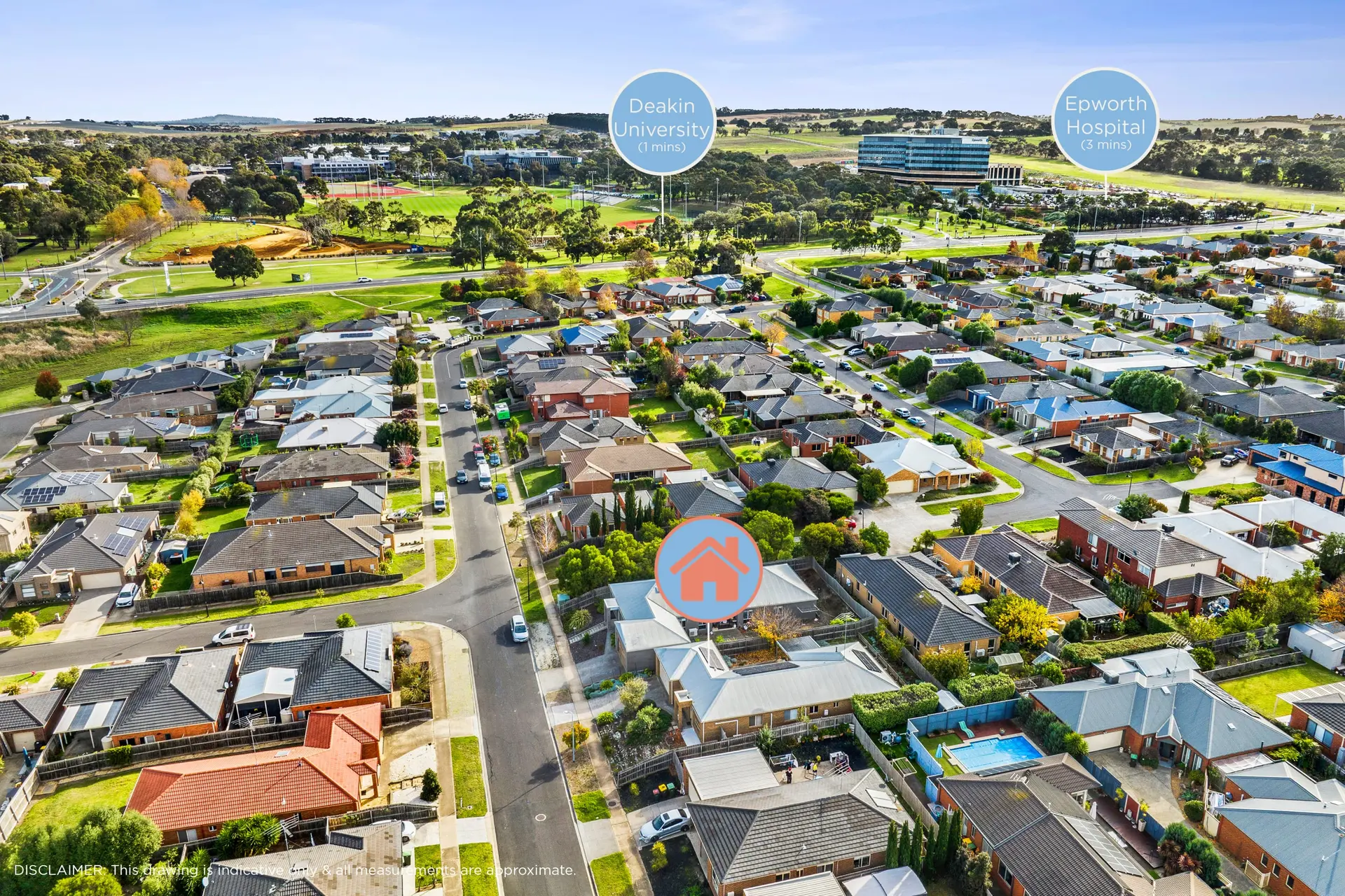 Aerial view of a suburban neighborhood with houses and trees, with Deakin University and Epworth Hos