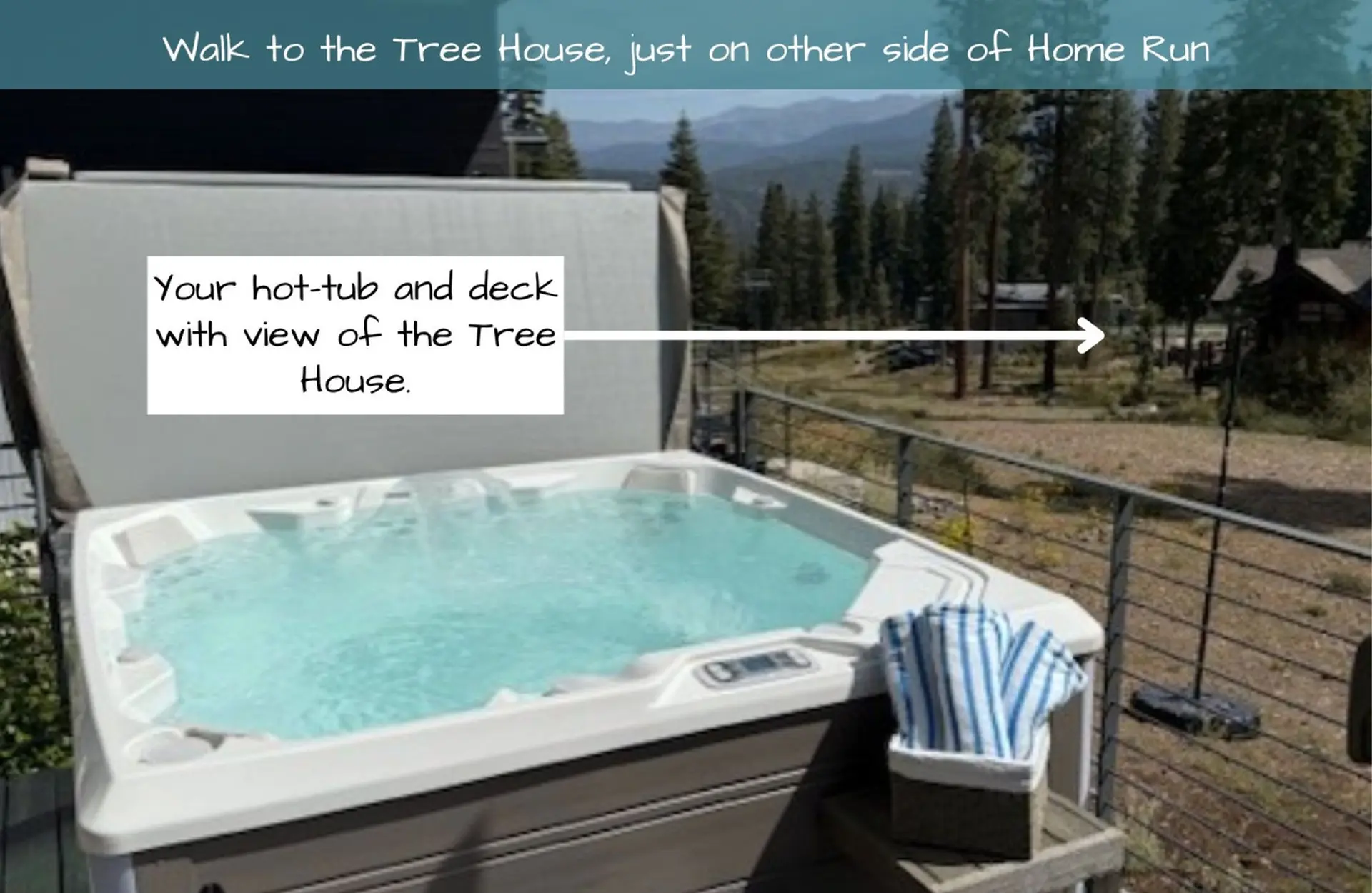 Hot tub and deck with a view of the tree house, a short walk away.