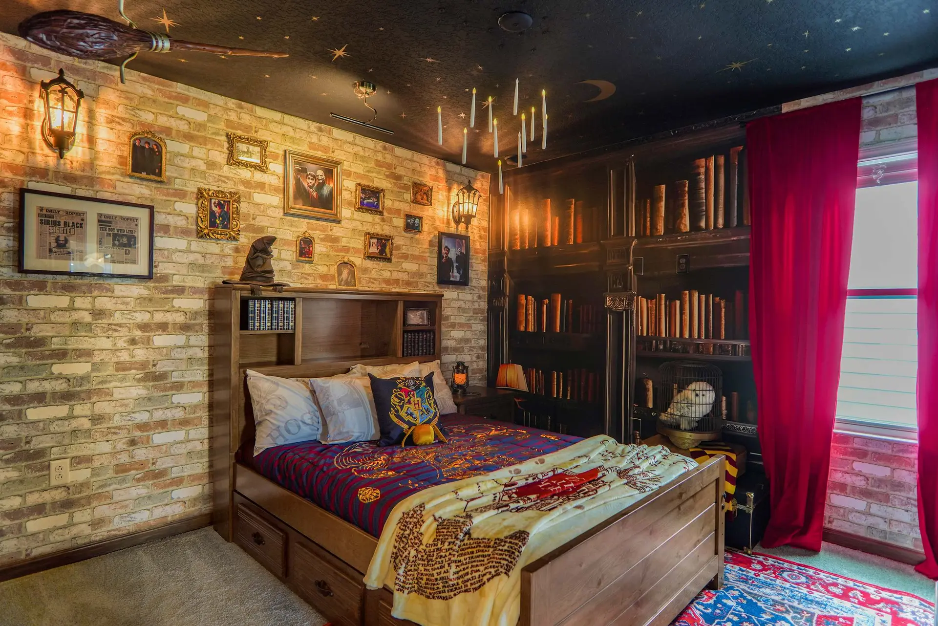 A Harry Potter themed bedroom with a bed, brick walls, and a broomstick.