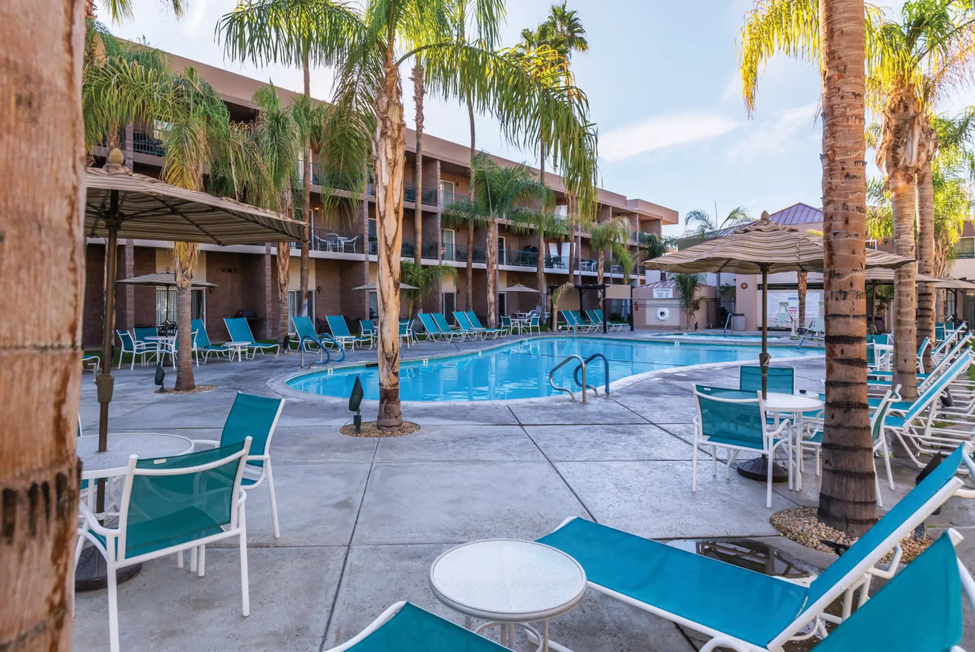 Family fun in Palm Springs in this resort 2BD condo with resort amenities including kids pool
