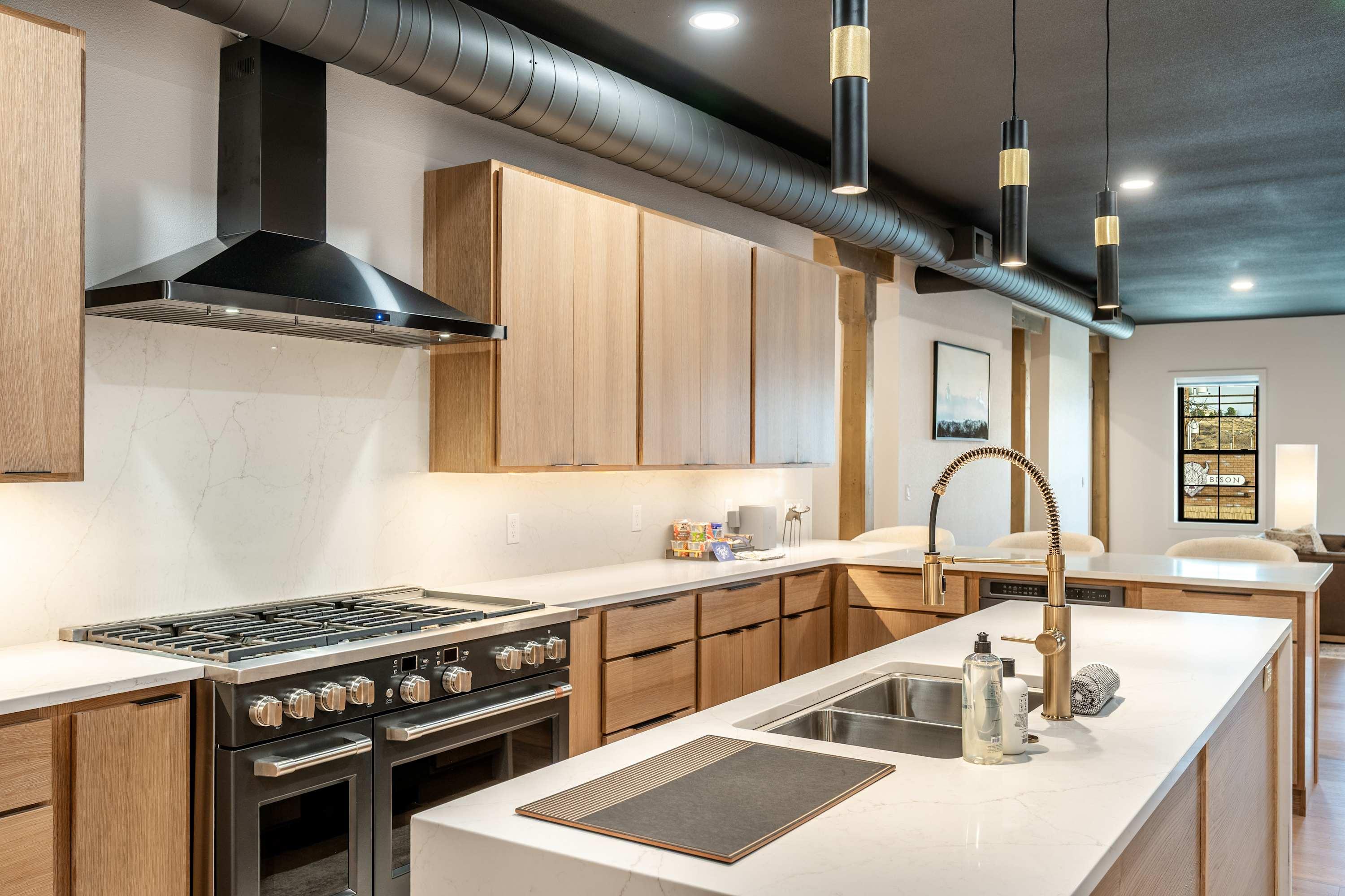 Chef's kitchen at The Onyx — full-size appliances and modern finishes