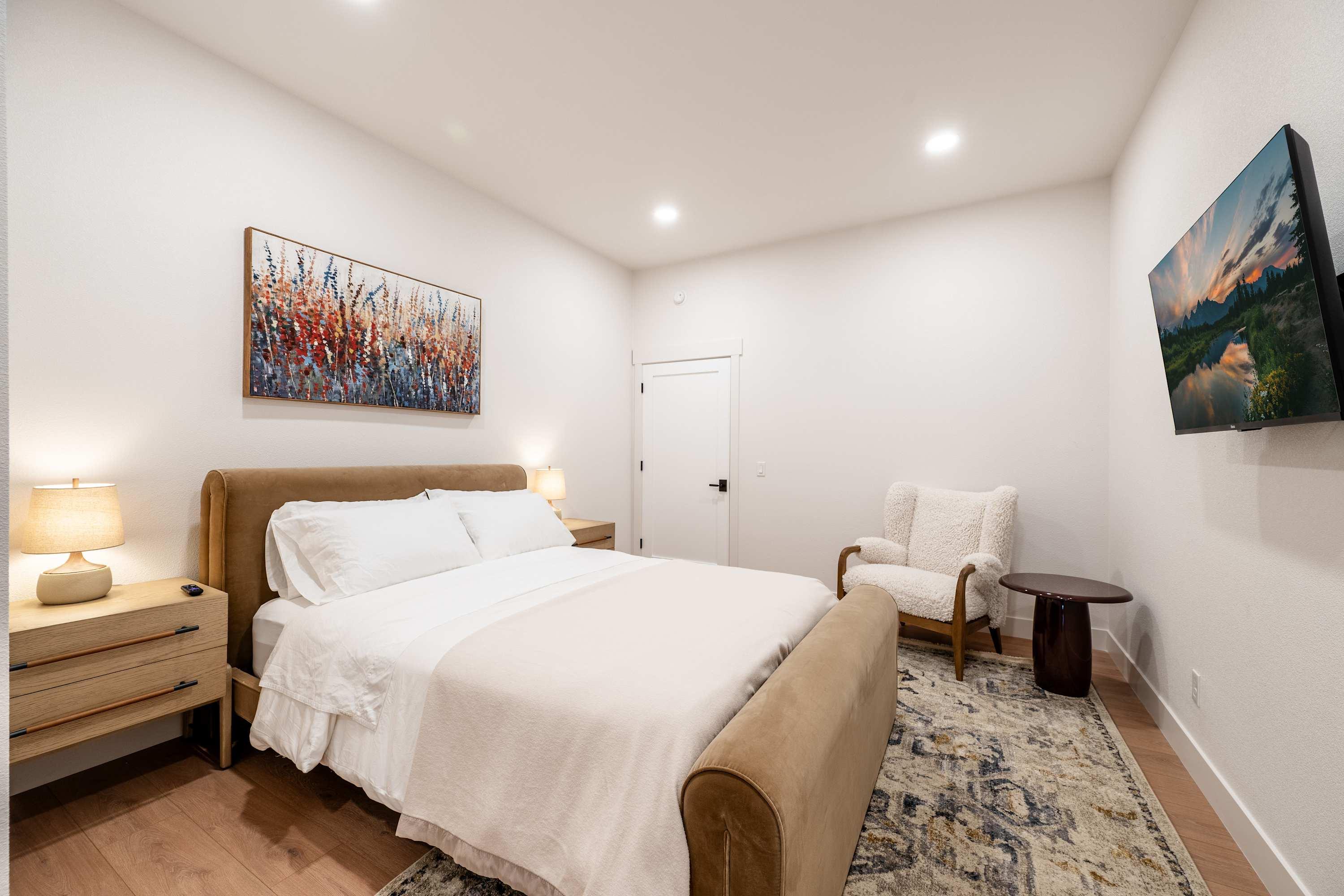 Second bedroom with queen bed at The Onyx