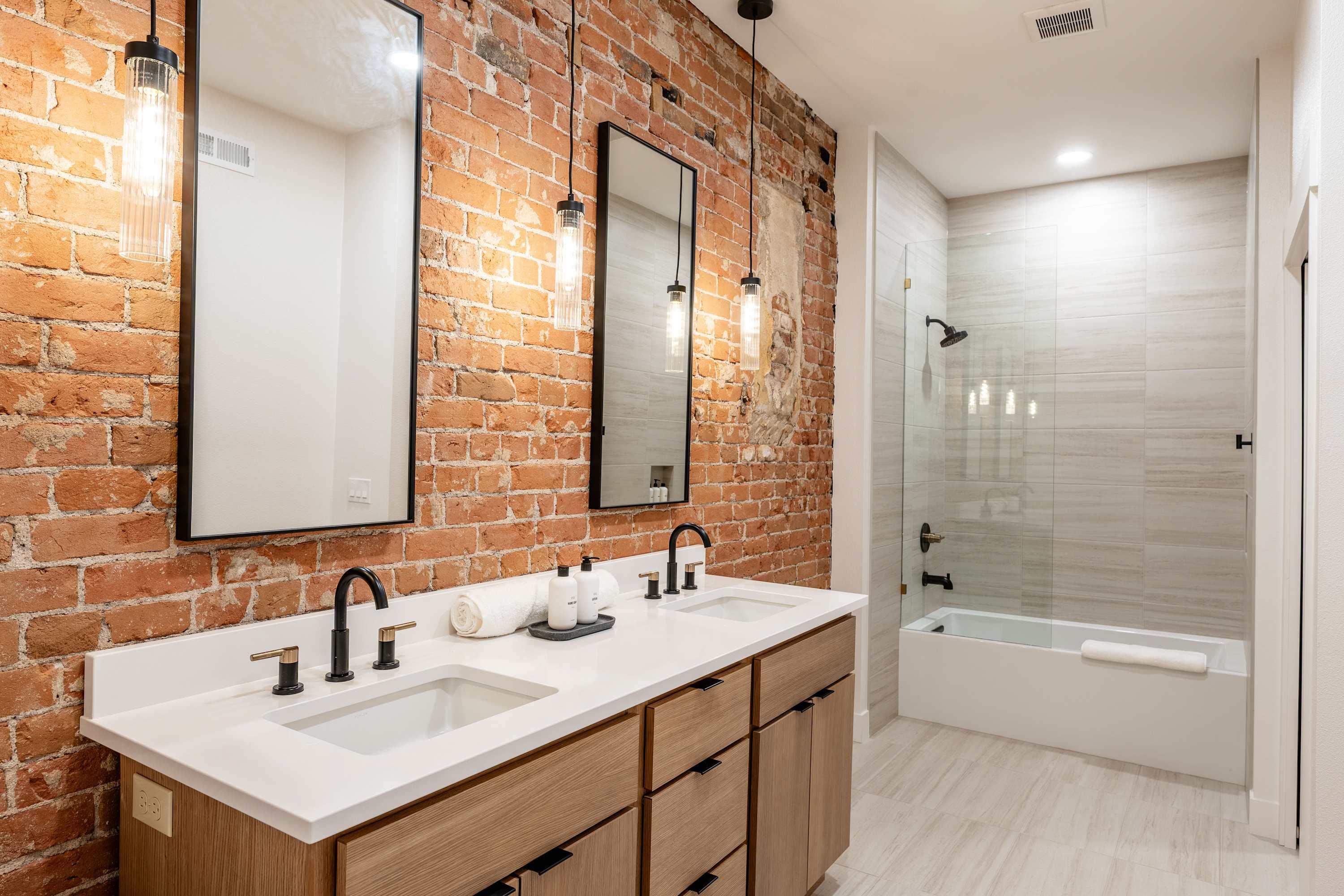 The Onyx dining area with exposed brick and industrial steel accents